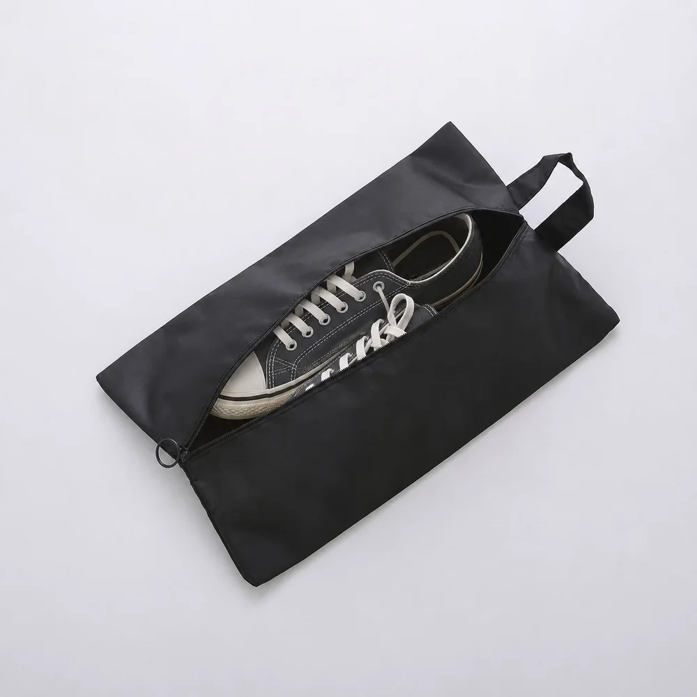 Bolsa para zapatos negra con zapatillas repelente al agua - VXM
