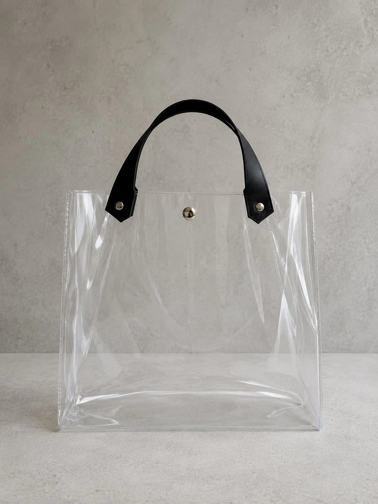 bolsa transparente con asas de símil cuero negras personalizada por mayor VXM