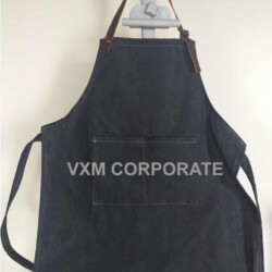 Pechera de mezclilla y cuero ideal para regalo corporativo y uniformes